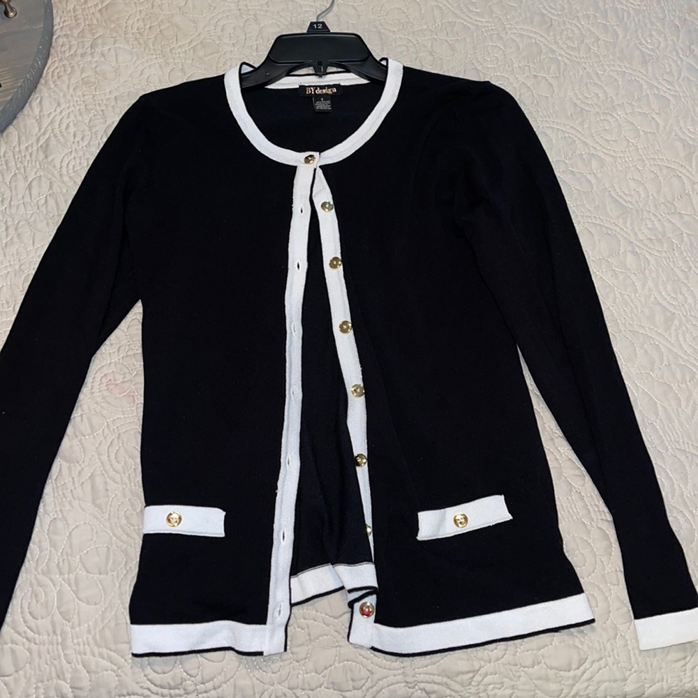 Black cardigan with white trim